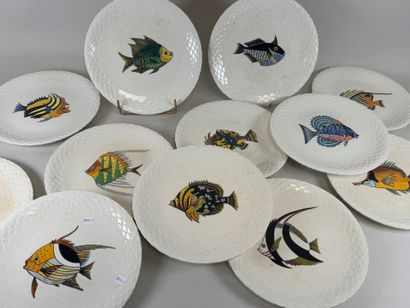 Gien.
Series of twelve circular white earthenware...