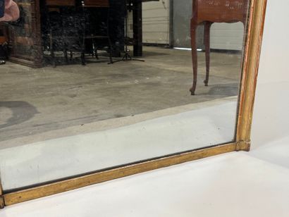 Rectangular glass in wood and gilded stucco.
Late...