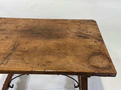 Walnut table with rectangular top, wrought-iron...