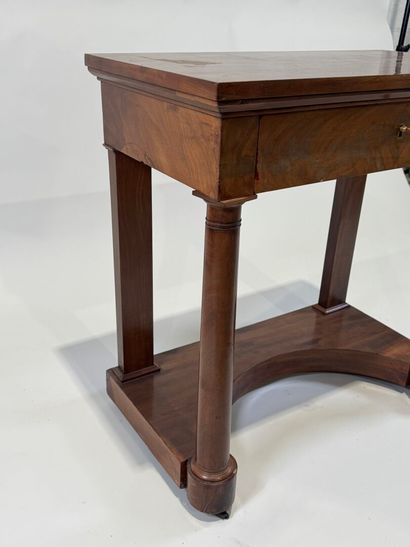 Small console on casters opening to a drawer...