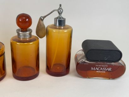 Colored glass and metal toilet set including...