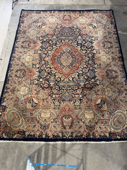 Large hand-knotted wool carpet with foliate...