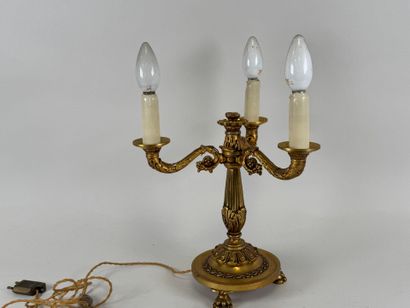 Gilded bronze three-light torch with circular,...