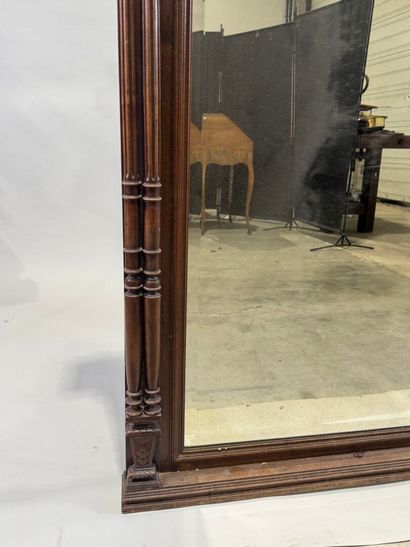 Large molded and carved walnut mirror with...