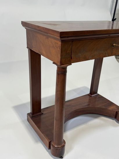 Small console on casters opening to a drawer...