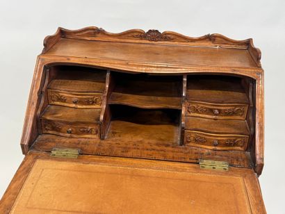 Small molded and carved wood desk opening...