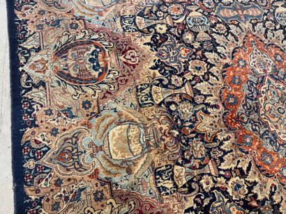 Large hand-knotted wool carpet with foliate...