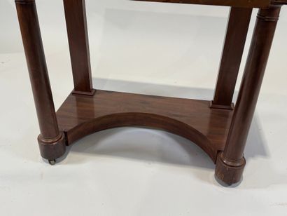 Small console on casters opening to a drawer...