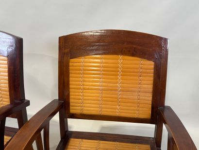 Pair of armchairs in exotic wood and bamboo.
80...