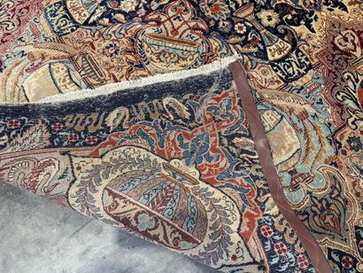 Large hand-knotted wool carpet with foliate...