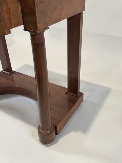 Small console on casters opening to a drawer...
