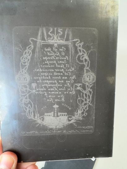 Set of two glass photographic plates, one...