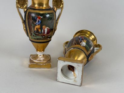 Pair of baluster vases on pedestal in polychrome...