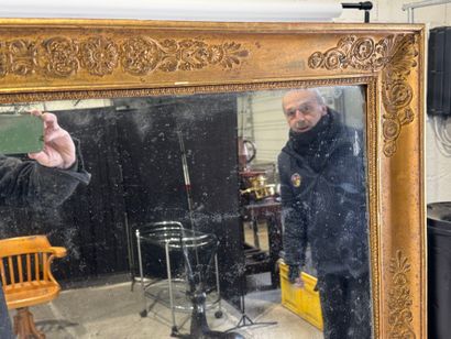 Wood and gilded stucco mirror with foliate...