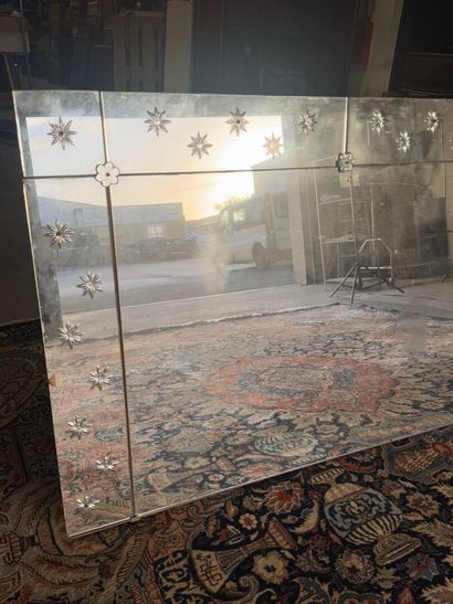Large rectangular mirror with flower design.
190...