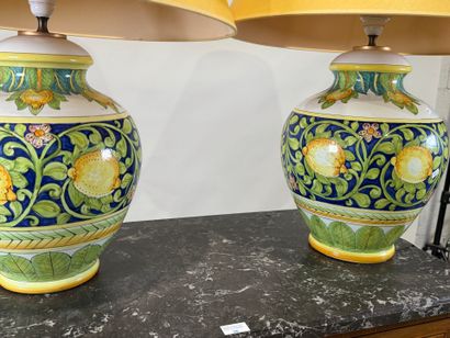 Pair of large polychrome ceramic lamps decorated...