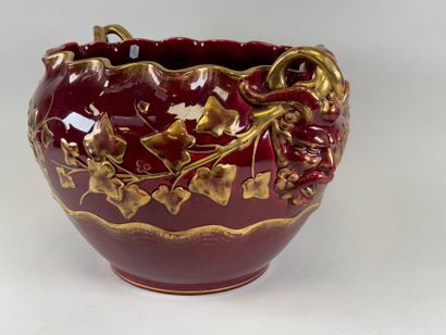 Large earthenware cachepot on a red ground...