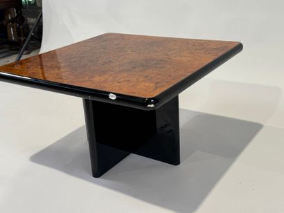 Small square burrwood coffee table, cross-legged.
35...