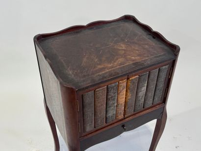 Molded wood bedside table opening with two...