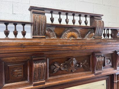 Large molded and carved walnut mirror with...