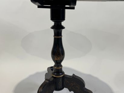 Trivet pedestal table in blackened burgundy...