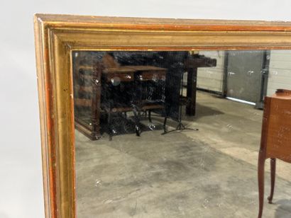 Rectangular glass in wood and gilded stucco.
Late...