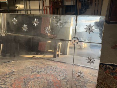 Large rectangular mirror with flower design.
190...