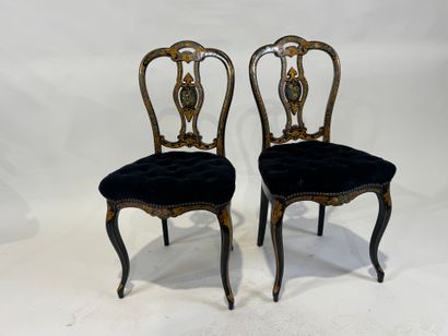 Pair of chairs in blackened wood and burgoté,...
