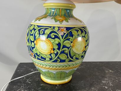 Pair of large polychrome ceramic lamps decorated...