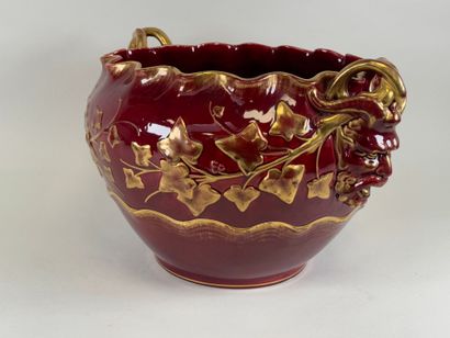 Large earthenware cachepot on a red ground...