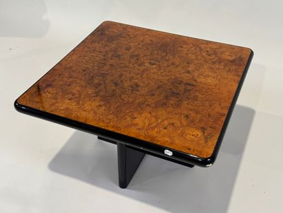 Small square burrwood coffee table, cross-legged.
35...