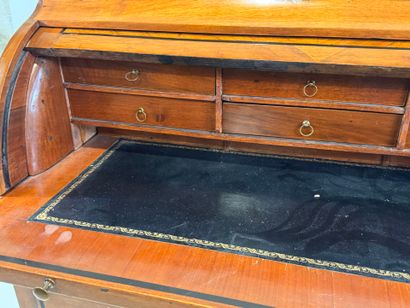 Inlaid wood cylinder desk decorated with...