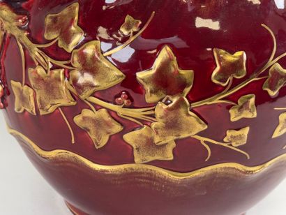 Large earthenware cachepot on a red ground...