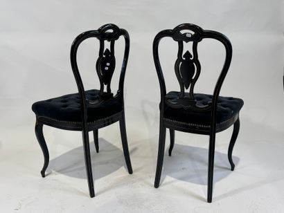 Pair of chairs in blackened wood and burgoté,...