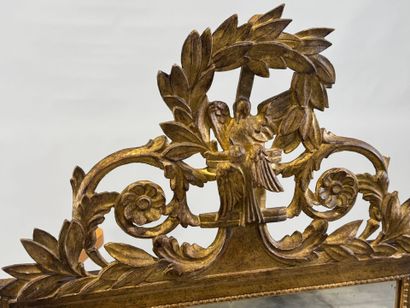 Gilded wood mirror decorated with strings...
