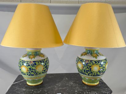 Pair of large polychrome ceramic lamps decorated...