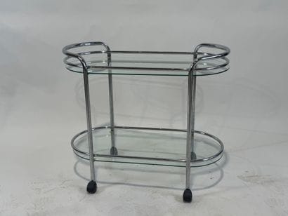 Chromed metal trolley with double glass top.
Work...