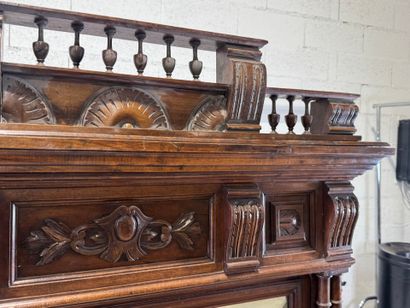 Large molded and carved walnut mirror with...