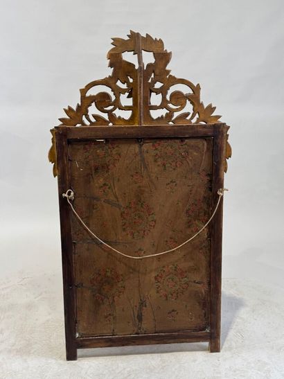 Gilded wood mirror decorated with strings...