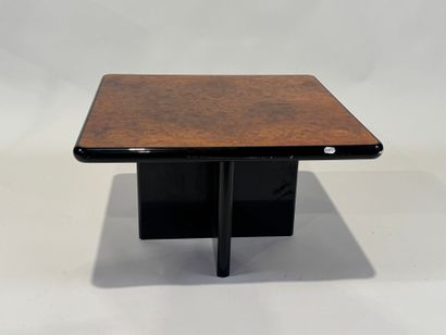 Small square burrwood coffee table, cross-legged.
35...
