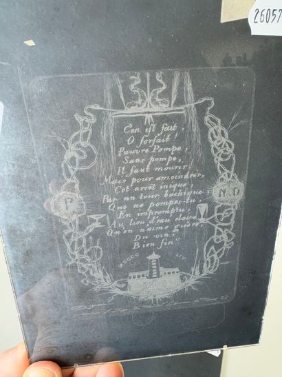 Set of two glass photographic plates, one...