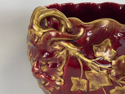 Large earthenware cachepot on a red ground...