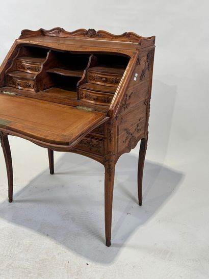 Small molded and carved wood desk opening...