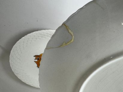 Gien.
Series of twelve circular white earthenware...