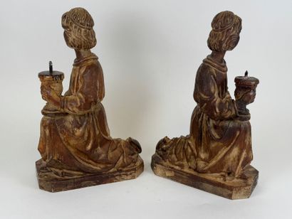 Pair of carved wood picnic tables decorated...