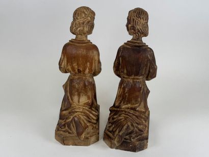 Pair of carved wood picnic tables decorated...