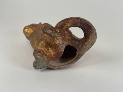 Terracotta subject with gilded patina depicting...