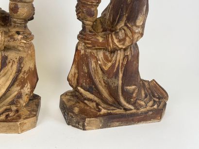 Pair of carved wood picnic tables decorated...