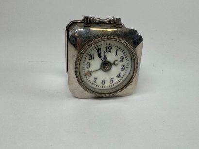 Small chrome-plated metal clock.
4.5 x 4.5...