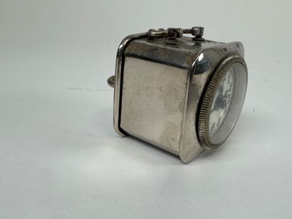 Small chrome-plated metal clock.
4.5 x 4.5...